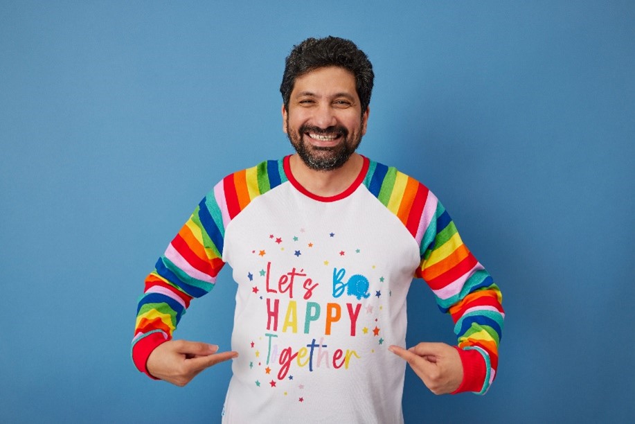 Man wearing Alder Hey pyjamas.