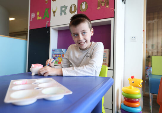 Child in play area of a ward