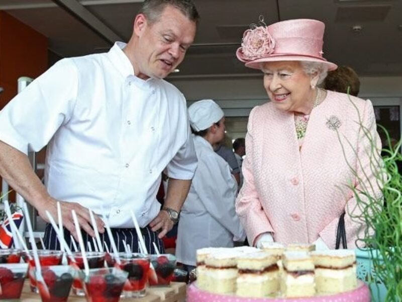 Queen and chef with tea party